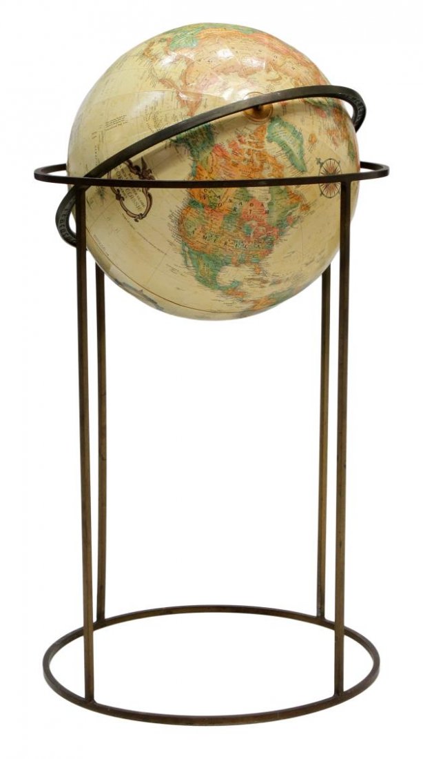 REPLOGLE GLOBE ON BRASS STAND: Brass globe stand, design often attributed, but questionable, to Paul McCobb (American,1917-1969), housing a "Replogle World Classic Series16" globe, 36"h, 19.25"d Start Price: $100.00