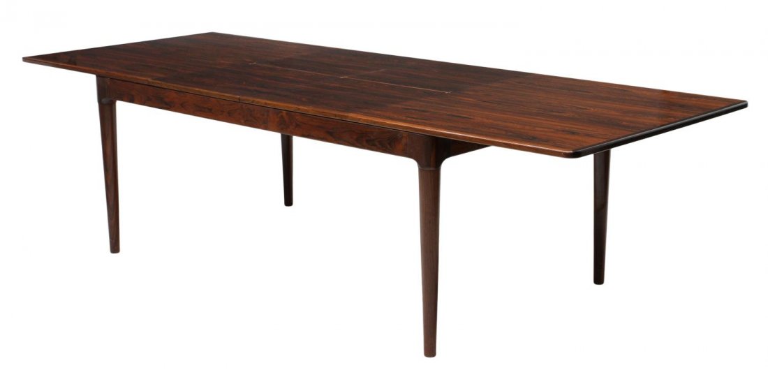 DANISH MID-CENTURY ROSEWOOD TABLE, HOVMAND OLSEN: Danish mid-century modern rosewood extension dining table, c. 1960, design by Arne Hovmand Olsen (Denmark, 1919-1989) for Mogens Kold Mobelfabrik, rectangular with each end pulling open revealing two