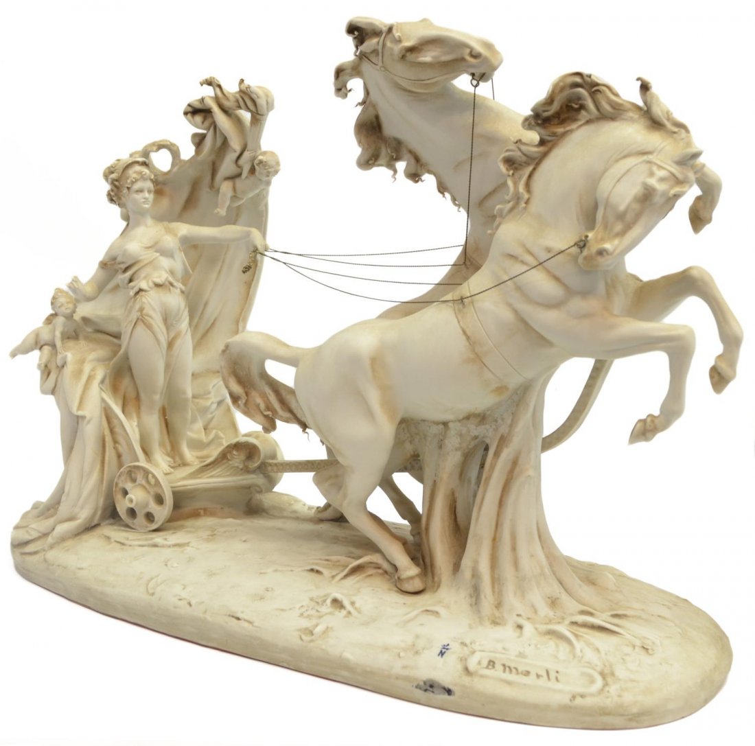 CAPODIMONTE BISQUE PORCELAIN MAIDEN & CHARIOT: Large Italian Capodimonte porcelain figural group, a Classical maiden drives a horse-drawn chariot, accompanied by her winged putti attendants, signed B. Merli, 15.75"h, 21"l, 9.5"w, 21lbs total Start