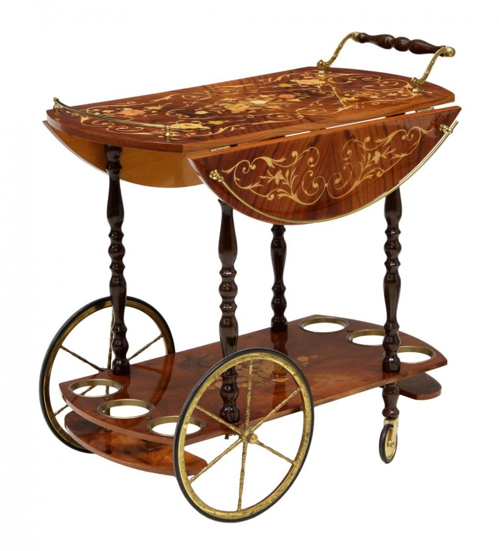 ITALIAN MARQUETRY TEA SERVICE CART: Italian tea or service cart, late 20th c. a gloss finish with foliate and floral inlay, the top with drop sides, the lower tier with a bottle rack at each end, large spoke wheels and castors, leaves e