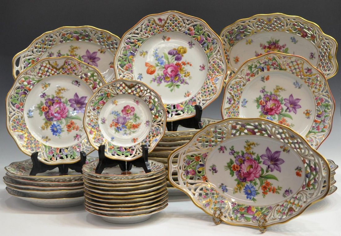 (39) SCHUMANN BAVARIA DRESDEN FLOWERS DINNERWARE: (lot of 39) Collection of Schumann Bavaria 'Dresden Flowers' parcel gilt dinnerware, reticulated lattice borders around floral decor on a white ground, comprising: (12) dinner plates, 10.25"diam; (12)