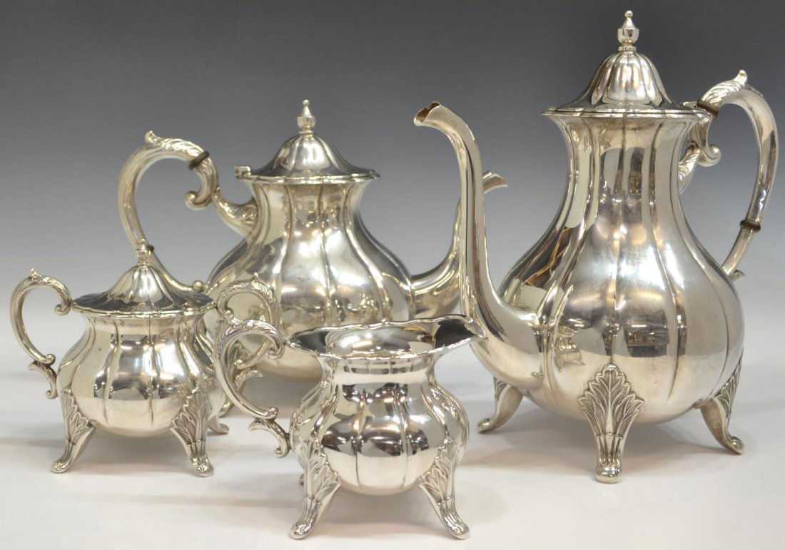 (4) FINE JAPANESE 950 SILVER COFFEE & TEA SERVICE: (set of 4) Japanese .950 sterling silver tea and coffee service, melon ribbed body rising on foliated legs, comprising: (1) coffee pot, 10.5"h; (1) teapot, 8.5"h; (1) lidded sugar, 5"h, 6"w; (1) cream