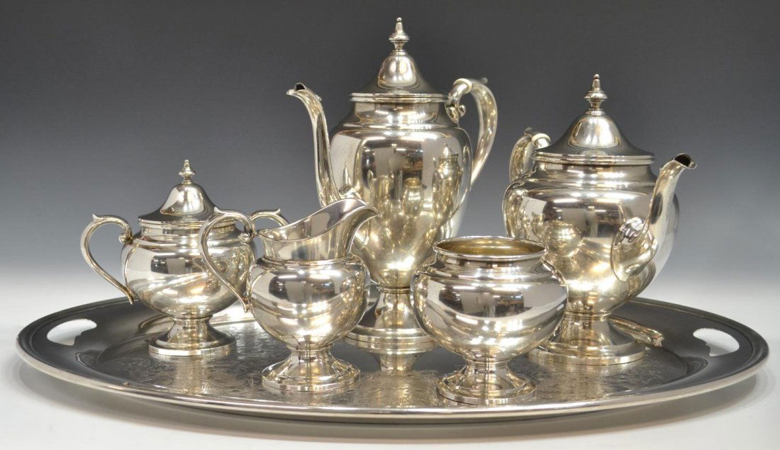 (7) GORHAM PURITAN STERLING TEA & COFFEE SERIVCE: (set) Gorham 'Puritan' sterling silver tea and coffee service comprised of five pieces: (1) coffee pot, 10.5"h; (1) teapot, 8.5"h; (1) cream pitcher, 5"h; (1) lidded sugar, 6"h; (1) open waste pot, 4.