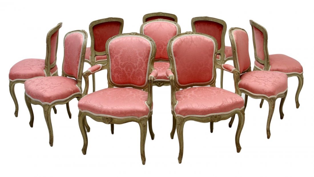 (10) FRENCH LOUIS XV STYLE DINING CHAIRS: (lot of 10) Louis XV style dining chairs, 20th c., each with carved shell crest, antiqued finish, pink foliate pattern damask upholstery at seats and back, cabriole legs: (2) arm chairs: 36.5"h, 22.5"