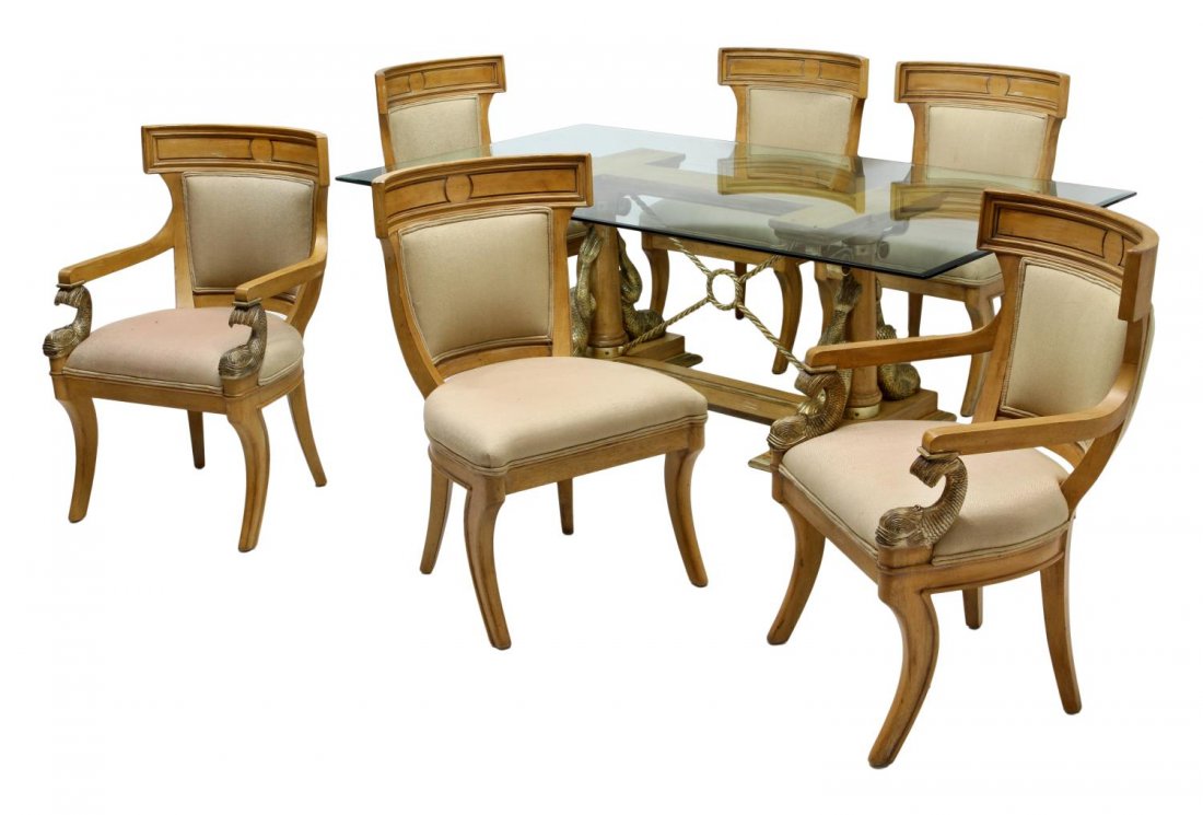 (7) CARVED DOLPHIN ACCENTED DINING SUITE: (lot of 7) Dining suite accented with carved wood dolphins: (1) beveled glass top dining table, the base with scrolled iron and carved dolphins, 29"h, 84"l, 48"d; (2) barrel back chairs having dolphin