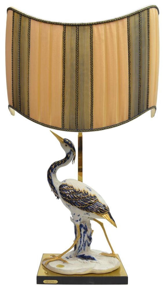 CAPODIMONTE PORCELAIN CRANE & LAMP, EDOARDO TASCA: Capodimonte porcelain polychrome and gilt sculpture, modeled as a crane, by Edoardo Tasca (Italian), a limited edition, numbered 447/1000, retaining sticker, some loss to feathers under neck, 18"h,10.