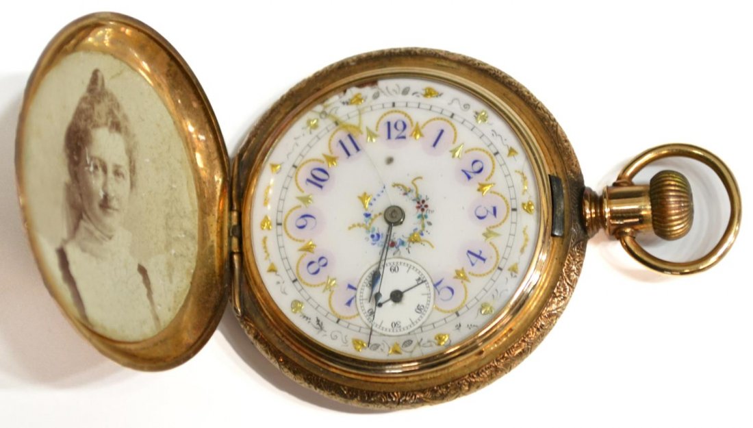 OPERATING ELGIN 14KT GOLD 15 JEWEL POCKET WATCH: Elgin 14kt gold hunter cased pocket watch, foliate and stag engraved case, fancy dial with seconds subdial, retaining ladies photo, Keystone case, 15 jewel movement, SN 8510471 (mfg. 1899), operating 