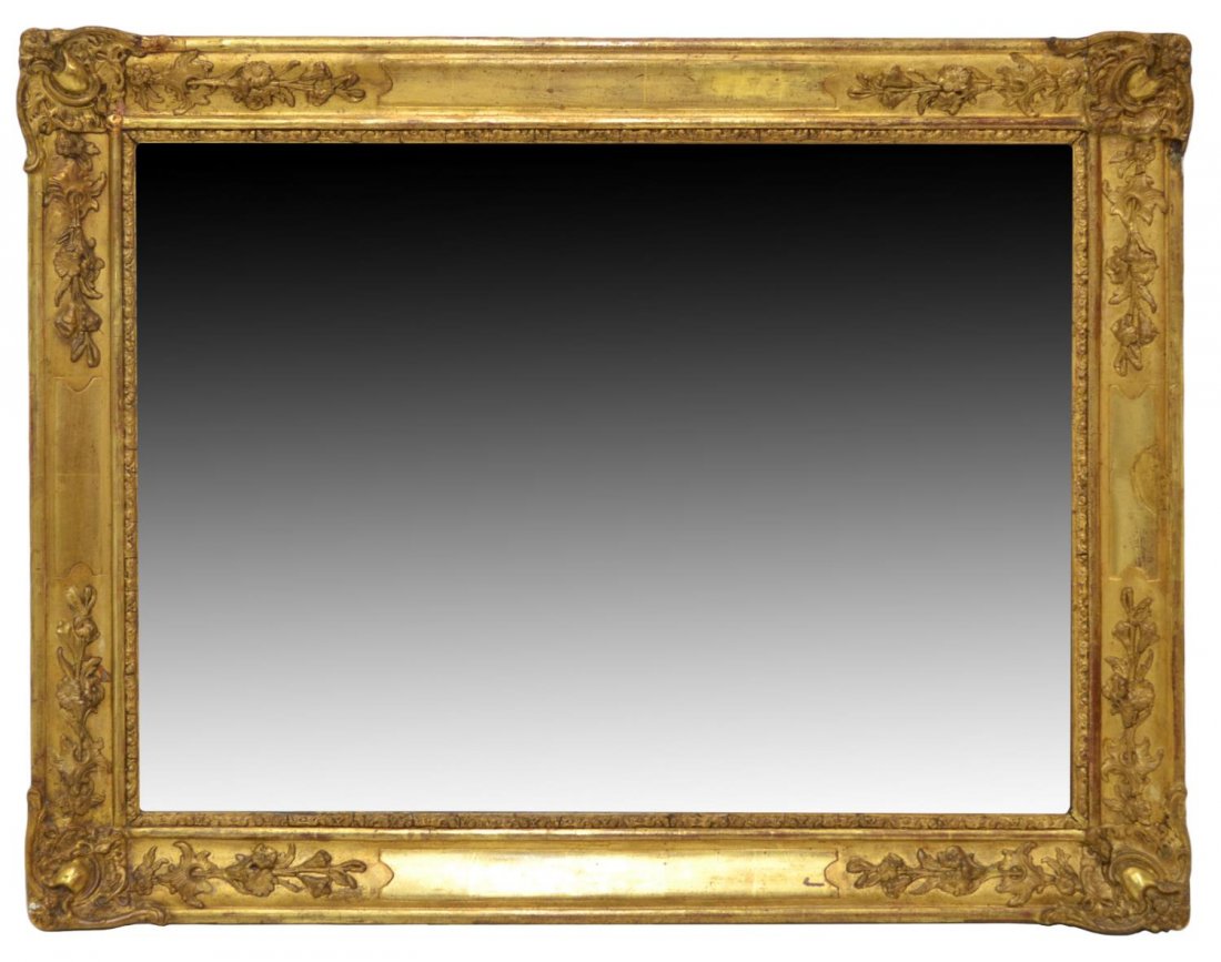 ANTIQUE SPAIN FLORAL DECOR GILTWOOD WALL MIRROR: Spanish giltwood wall mirror, c. 1900, flowering vine decor, approx 25.5"h, 39"w, 26lbs Start Price: $100.00
