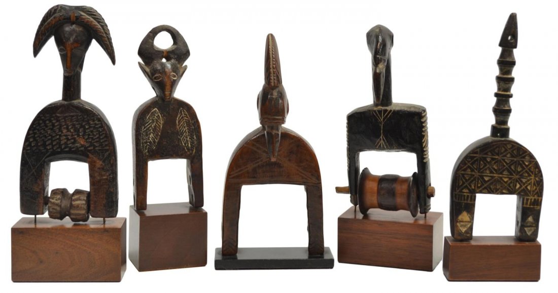 (5) WEST AFRICAN CARVED WOOD TRIBAL HEDDLE PULLEYS: (lot of 5) West African carved wood tribal heddle pulleys, part of a weaving loom, including (1) janiform animal, of the Guro tribe, having original spool, (1) bird mosque head, of the Senufo people, 