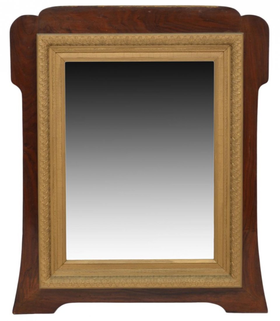 ANTIQUE SPAIN MAHOGANY & GILTWOOD BEVELED MIRROR: Large giltwood and mahogany wall mirror, c. 1900, the foliated giltwood frame, centering a beveled mirror plate, all mounted on a figured mahogany backing, approx 39.5"h, 32.25"w, 25lbs Start Price: $