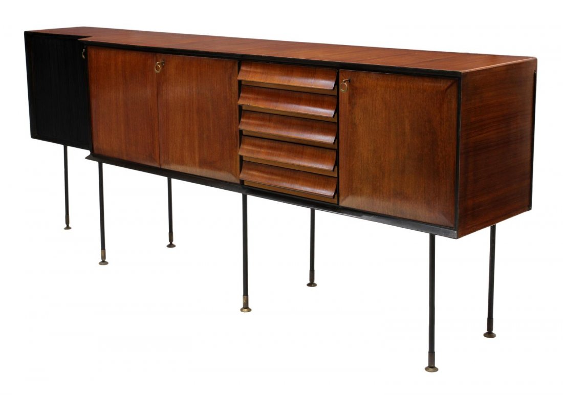 ITALIAN MID-CENTURY MODERN SIDEBOARD, BORSANI: Italian mid-century modern sideboard, c. 1950, design by Osvaldo Borsani (Swiss-Italian, 1911-1985), an angular top over four doors and five drawers, one door being fluted and ebonized, all rising on 