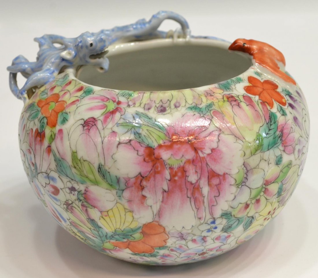 CHINESE MILLEFLEUR ENAMELED PORCELAIN BRUSH WASHER: Chinese enameled porcelain brush washer, late 19th/early 20th c., painted with a millefleur design with the figures of a chilong and bat at the inverted mouth, marked ‘CHINA’ , roughness underfoot