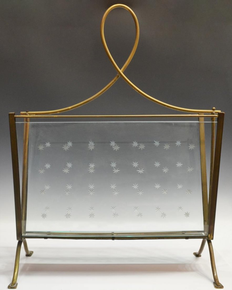 ITALIAN ETCHED GLASS & BRASS MAGAZINE RACK: Italian glass and brass magazine rack, c. 1960, gilt frame enclosing two clear glass panels with etched star accents, raised on four conforming feet, 24.5"h, 18.5"w, 9"d, 8.75lbs Start Price: $80.00
