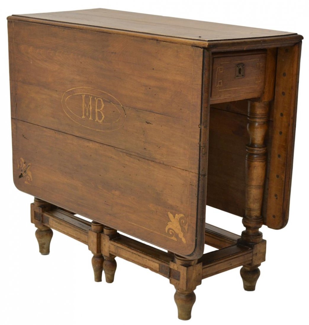 ANTIQUE SPANISH INLAID DROP LEAF TABLE, 19TH C.: Spanish double gate leg drop leaf table, 19th c., floral inlay at each corner, a monogram at one side, two end drawers, leaves open: 55.5"l, leaves down: 28.5"h, 14.5"l, 31.5"d Start Price: $150.00