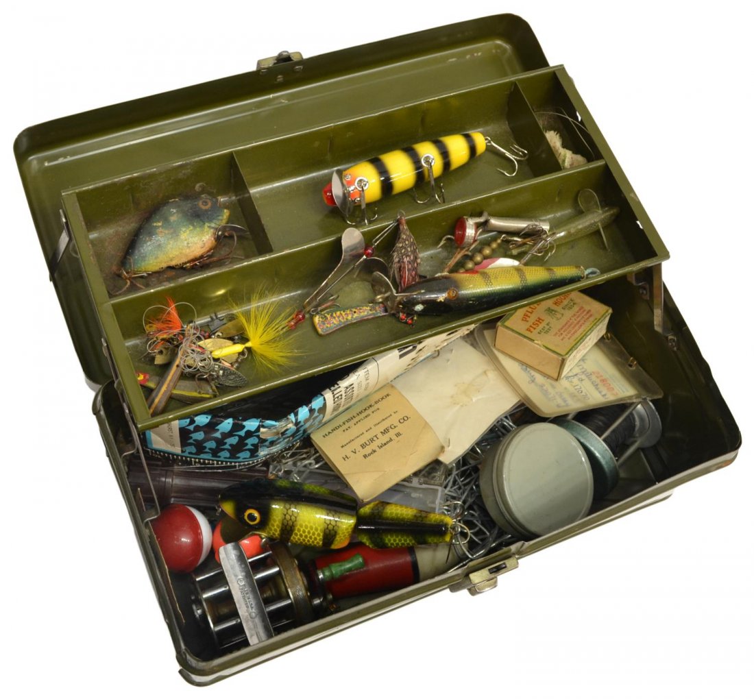 VINTAGE FISHING TACKLE BOX & ACCESSORIES: (lot) Vintage fishing tackle box with substantial quantity of lures and reels, highlights including a Record and a Shakespeare 'Criterion' 1961 fishing reel, H.V. Burt Mfg. Co. and Plueger fish hooks,