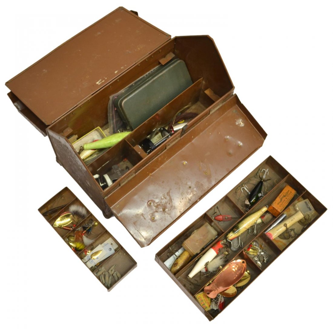 VINTAGE FISHING BOX PACKED FULL OF LURES & REELS: (lot) Vintage fishing tackle box with substantial quantity of lures and reels, highlights including South Bend 'Cast Oreno' and J.C. Higgins reels, Daniel Bros. Lure Co., South Bend, Trent Bait Compan