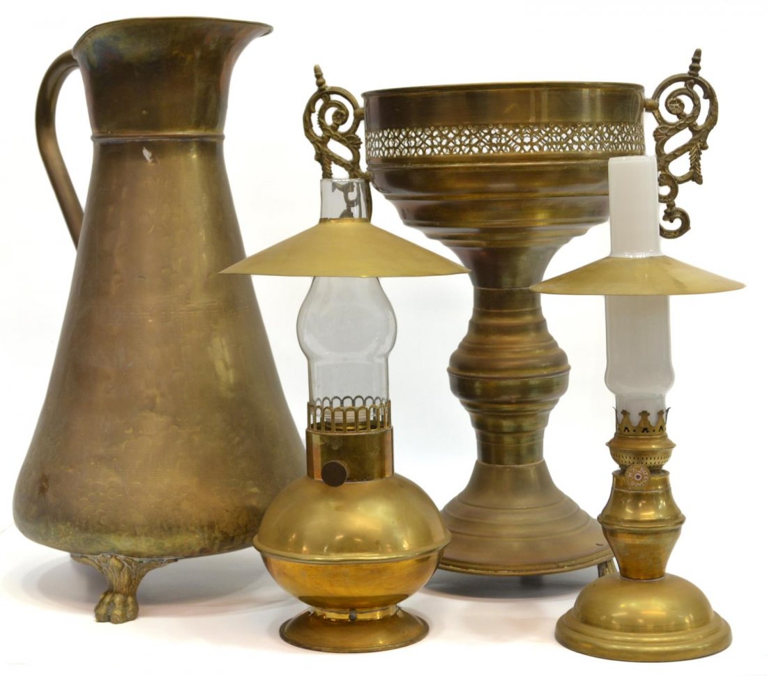(LOT) SPAIN KEROSENE LAMPS & METAL PLANTER, EWER: (lot of 4) Vintage metalware and lighting: (2) brass and glass kerosene lamps, one marked V.M. Patentado on the wick turner, the other converted to European electricity (needs wiring), each retaining 