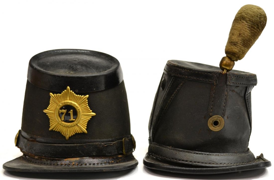 (2) CIVIL WAR & POST WAR UNION SOLDIERS HATS: (lot of 2) Military hats: (1) Civil War era shako hat, hole and tear at side, two part brim present but separated; (1) post Civil War hat with badge of the 71st National Guard, crossed rifle side butt