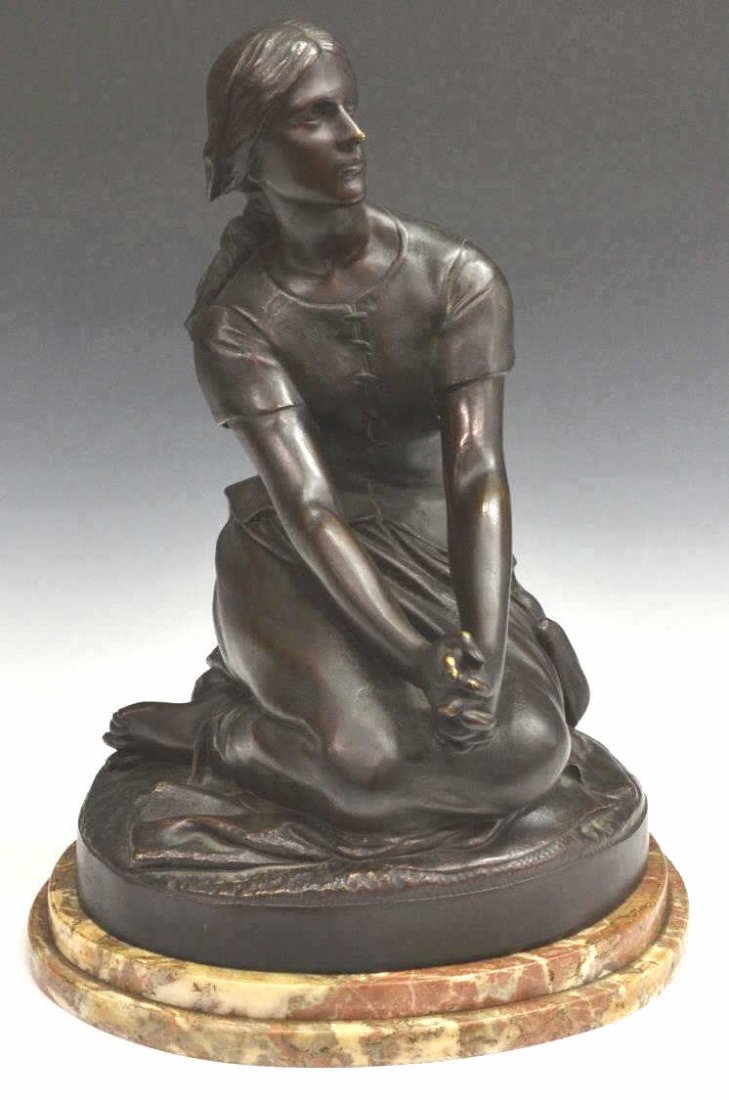 PATINATED BRONZE, SEATED MAIDEN, ON MARBLE BASE: Bronze sculpture in a dark patinated finish, seated maiden with clasped hands, signed verso Chapuis, resting upon a circular variegated marble base, approx 17"h, 12.25"w, 39lbs Start Price: $200.00