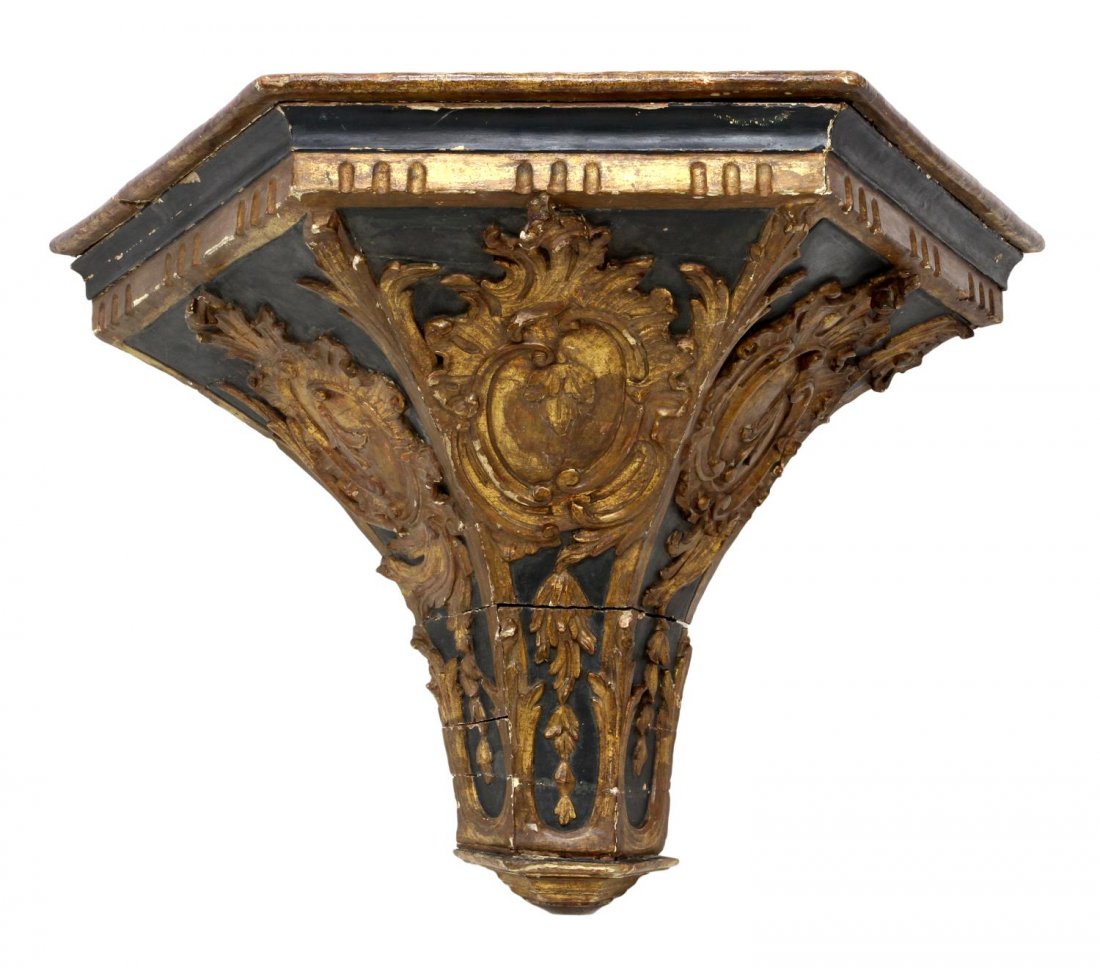 LARGE SPANISH LOUIS XV PARCEL GILT WALL BRACKET: Large Spanish Louis XV parcel gilt and gesso architectural bracket, 18th c., each side with rocaille carving on a painted ground, condition consistent with age, 28"h, 44"w, 23"d Start Price: $300.00