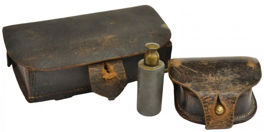(3) CIVIL WAR CARTRIDGE BOX, CAP BOX, RIFLE OILER: (lot of 3) Union Civil War equipment: (1) Calvary carbine cartridge box with divided tin insert, 4.25"h, 7.25"w; (1) rifle oiler, brass and pewter, 3"h, 1"d; ( 1) leather cap pouch, marked U.S., 3.75"