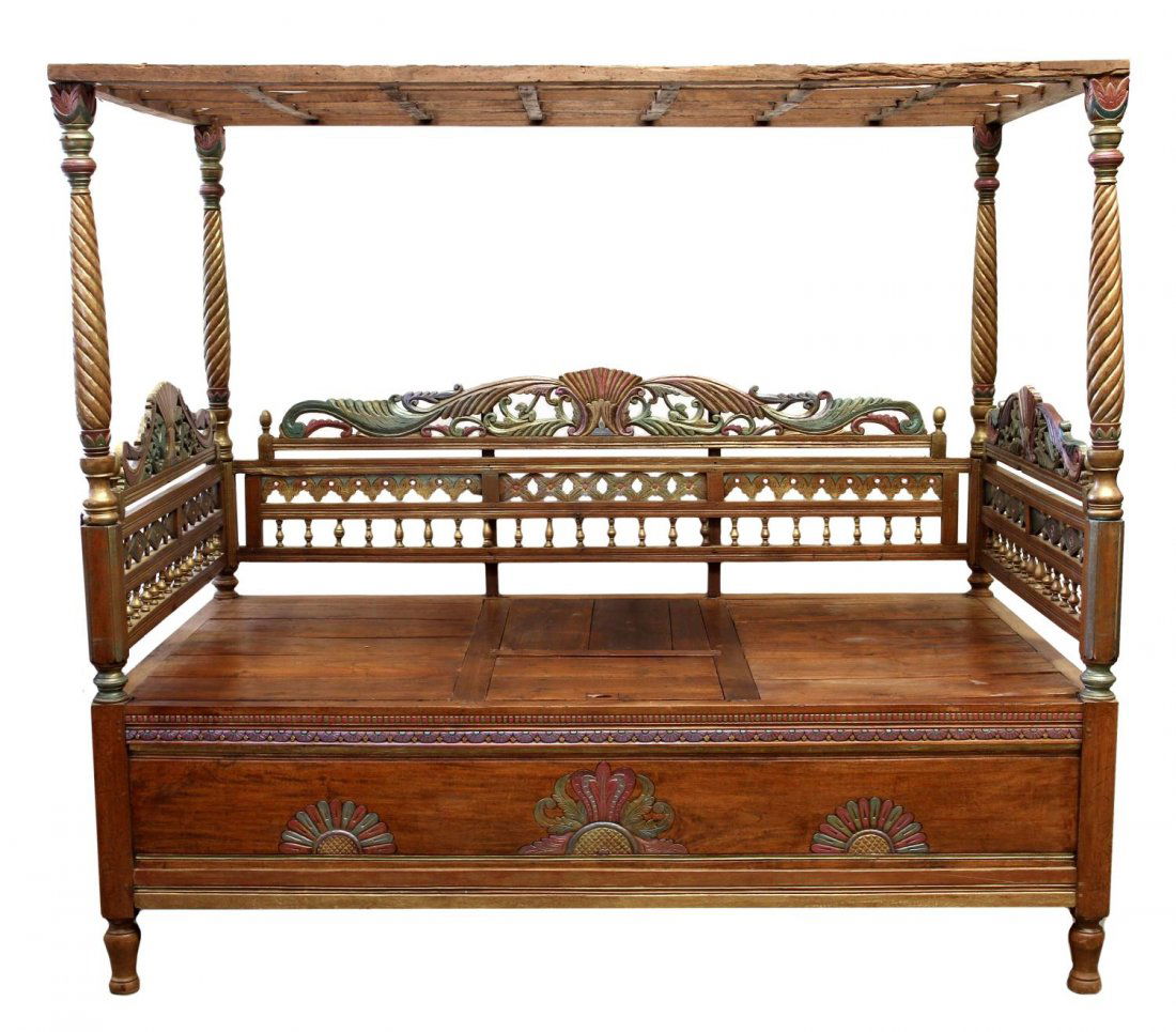 FINELY CARVED & PAINTED FOUR POSTER CANOPY BED: Finely carved polychrome parcel gilt canopy bed, Thailand, 20th c., hand embellished paint decoration by a local Austin artist, open front with a canopy top raised on spiral supports, floral and folia