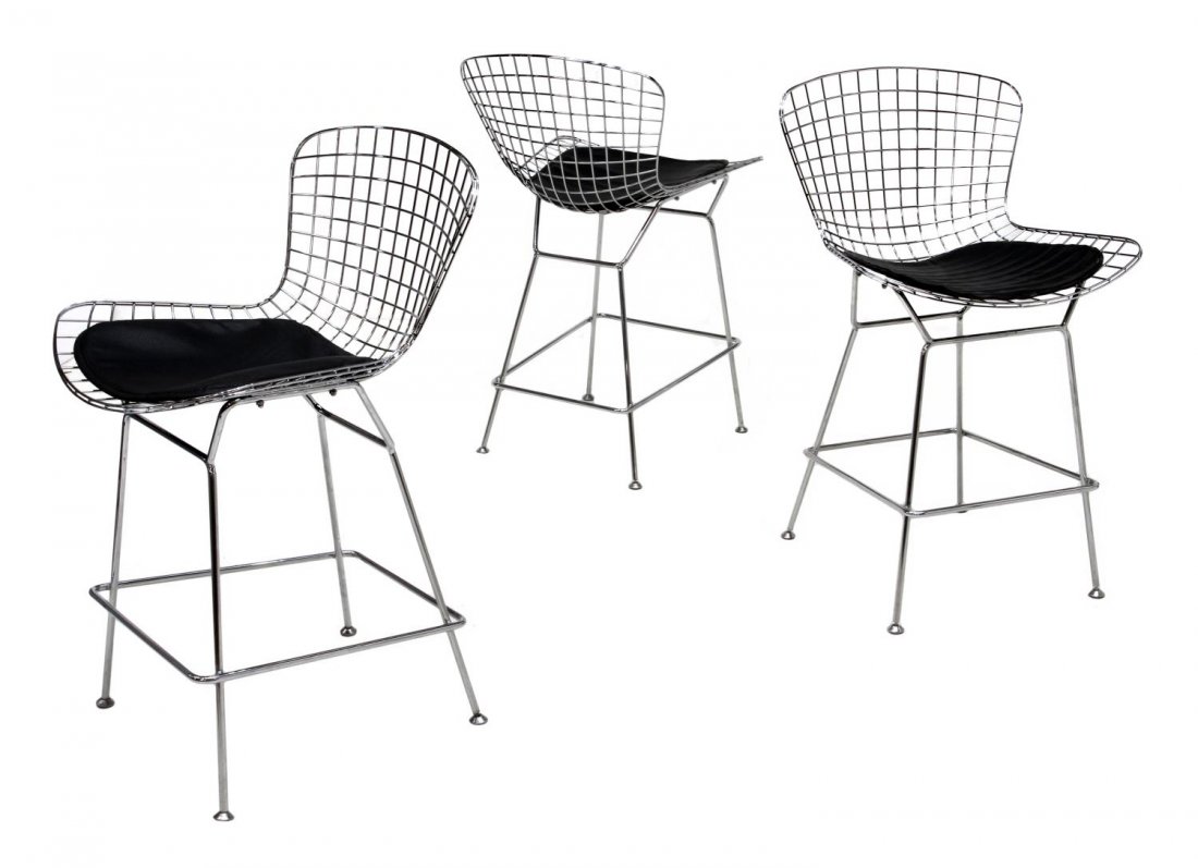 (3) BERTOIA STYLE CHROMED STEEL WIRE BARSTOOLS: (lot of 3) Modern chromed steel wire barstools, modeled after the original 'Bertoia chair' by Harry Bertoia (Italian/American, 1915-1978) for Knoll, each with black leatherette pad, approx 36"h, 21.5"