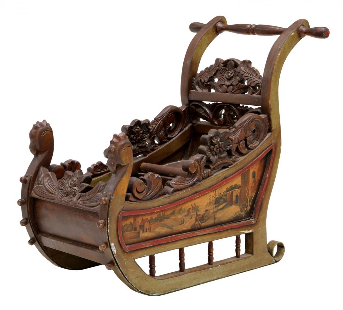 ANTIQUE STYLE CARVED & PAINTED CHILD'S DOLL SLEIGH: Doll sleigh in the antique style, carved and painted with flowers, metal lined bottom, curved seat, 25.5"h, 29"w, 19.25"d, 20.5 lbs Start Price: $80.00
