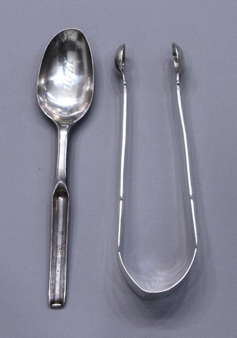 GEORGIAN SILVER MARROW SPOON & COIN SILVER TONGS: (lot of 2) A scarce Georgian silver marrow spoon, hallmarked IR, possibly John Reily, London, first quarter 19th c., the oval bowl later engraved 1700, 6"l; (1) coin sugar tongs, unmarked, 5.5"l; 2.18