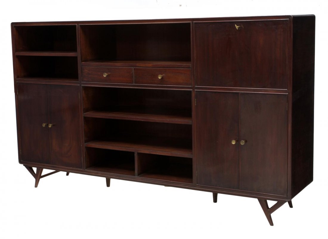 ITALIAN MID-CENTURY MODERN SIDEBOARD, ICO PARISI: Italian mid-century modern mahogany sideboard, c. 1960, in the manner of Ico Parisi (Italian, 1916-1996), rectangular with random storage slots, four doors, two drawers, a drop front bar, rising on ta