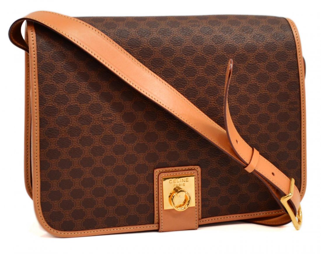 CELINE BROWN CANVAS & LEATHER SHOULDER BAG: Celine shoulder bag in brown canvas with beige leather adjustable shoulder strap and trim, gold hardware, zipper pocket to interior, bag: approx 8.75"h, 10"w, 2.75"d, 1lb Start Price: $125.00