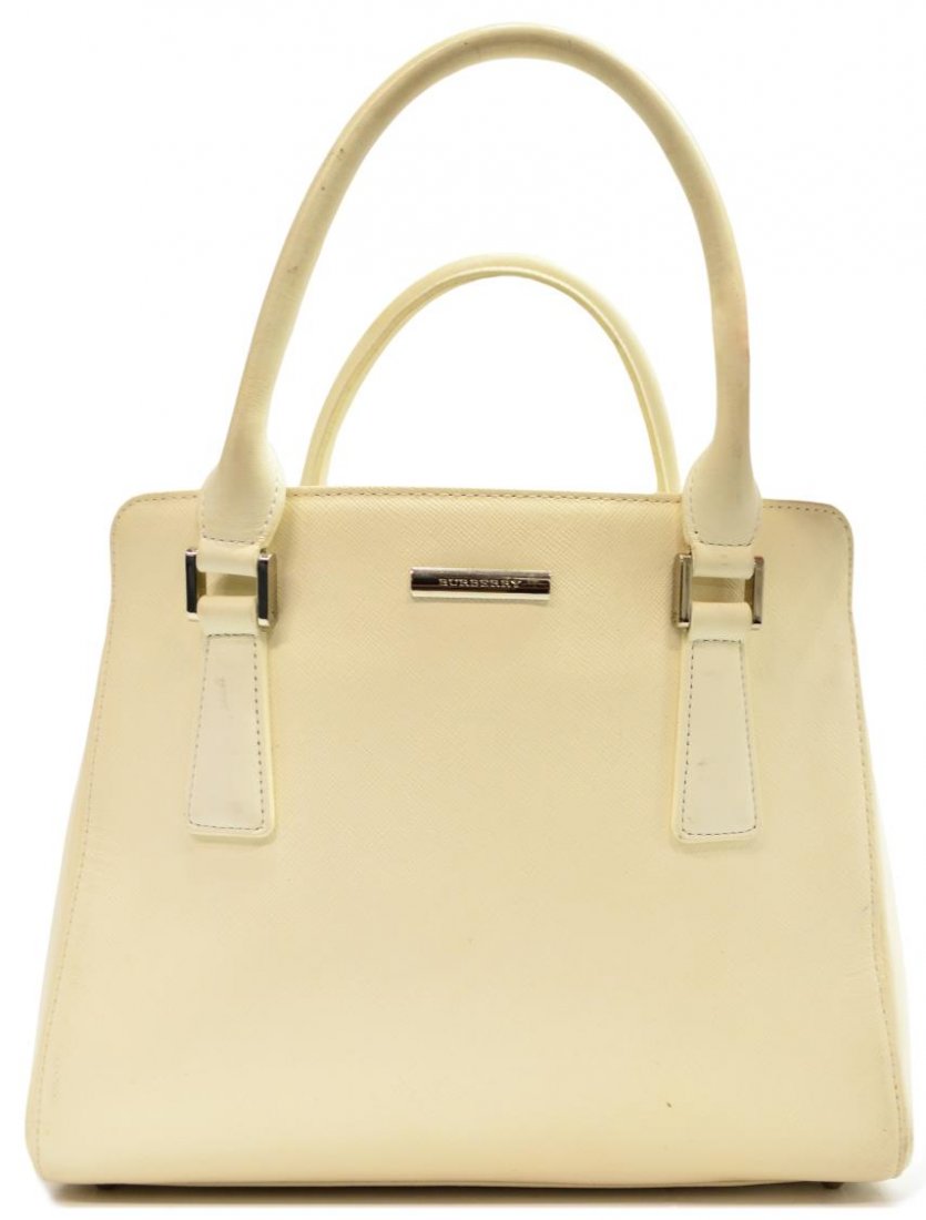 LADIES WHITE BURBERRY HANDBAG PURSE: Ladies Burberry white handbag, two compartment interior with signature tartan pattern lining, one open and two zipper pockets, some discoloration, bag: approx 8.5"h, 10"w, 4"d, 1.25lbs Start Price: $1
