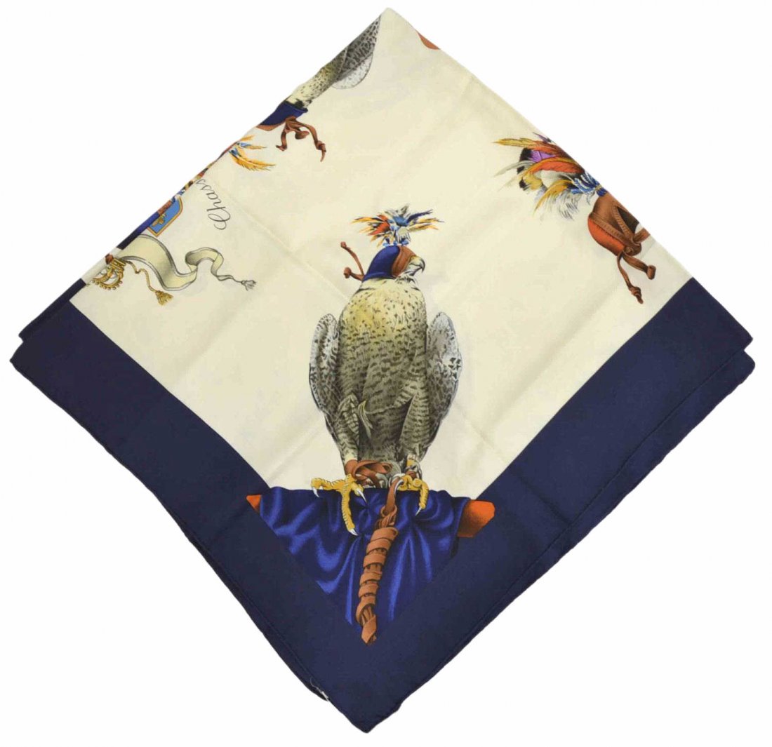 HERMES CHASSE A VOL HENRI DE LINARES SILK SCARF: Hermes Chasse à Vol scarf in off white and navy silk, original design by Henri De Linares, retaining original tag, some light blue spotting, approx. 35"h, 35"w Start Price: $100.00