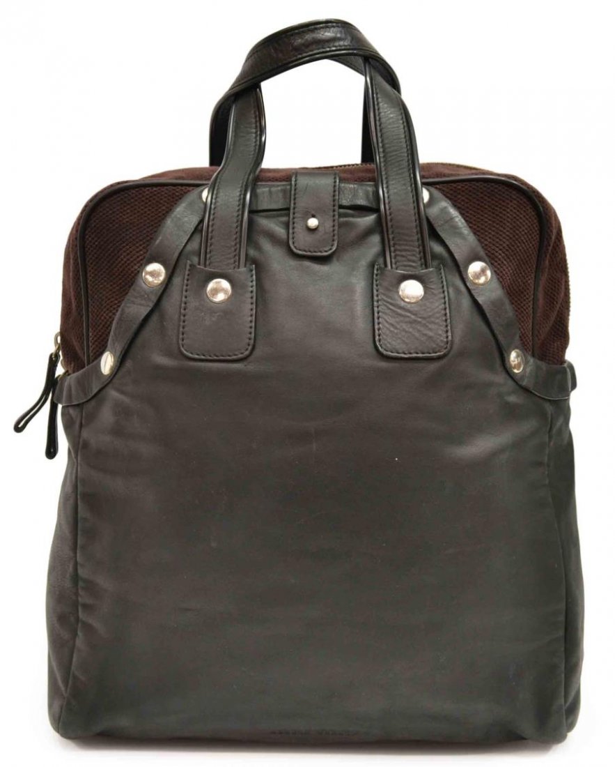 MIU MIU BLACK LEATHER & BROWN FABRIC HANDBAG: Miu Miu handbag in black leather with brown fabric detail, silver tone metal hardware, black lined interior with zipper pocket, on four small metal feet, bag: approx 15"h, 16"w, 4.25"d, 2lbs Start Pri