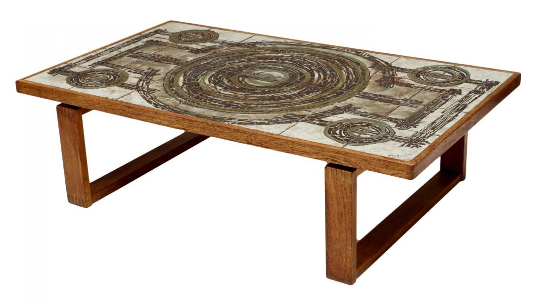 DANISH MID-CENTURY MODERN TILE TOP COFFEE TABLE: Danish mid-century modern coffee table, design by Ox-Art, wood framed tile top rising on block supports, signed and dated '75, 16.5"h, 57.25"w, 33.25"d Start Price: $150.00