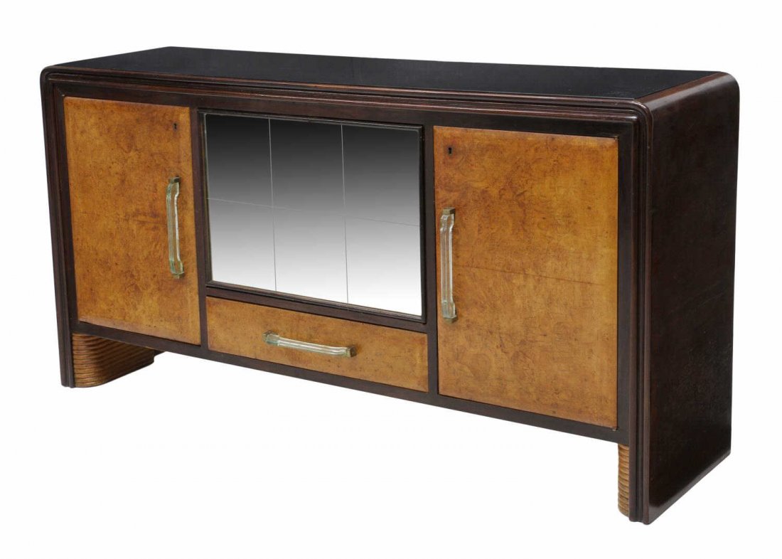 ITALIAN MID-CENTURY SIDEBOARD, OSVALDO BORSANI: Italian mid-century modern burl front sideboard, design by Osvaldo Borsani (Swiss/Italian, 1911-1985), door handles by Fontana Arte, a black glass top over the central mirror faced drop front door ope