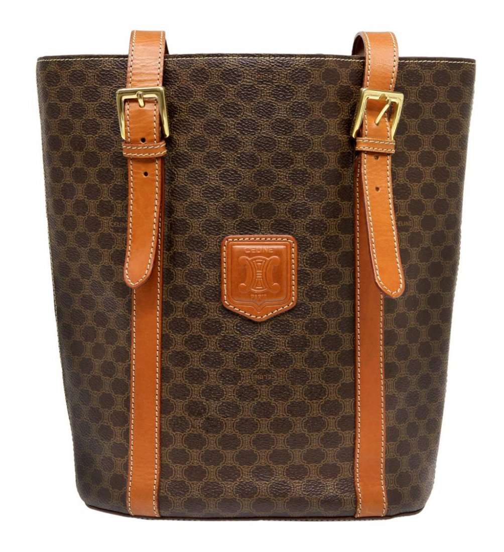 CELINE BROWN CANVAS & LEATHER SHOULDER BAG PURSE: Celine shoulder bag in brown monogrammed canvas, Made in Italy, long adjustable tan leather shoulder strap, central zipped pocket, bag: approx. 11"h, 11.75"w, 1.25lbs Start Price: $125.00