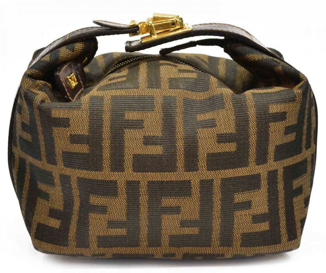 FENDI MONOGRAMMED CANVAS ACCESSORIES POUCH: Fendi monogram canvas toiletries pouch, buckle closure, black lined interior, bag: approx 6"h, 9.5"w, 4"d, .5lb Start Price: $50.00