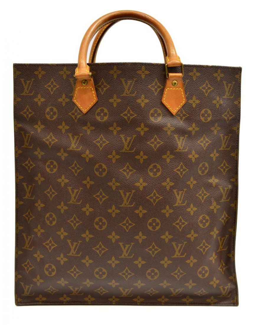 LOUIS VUITTON MONOGRAM CANVAS SAC PLAT TOTE BAG: Louis Vuitton monogram canvas ‘Sac Plat’ tote / shopping bag, leather handles, some pen marks to interior, bag: approx 15”h, 14”w Start Price: $300.00