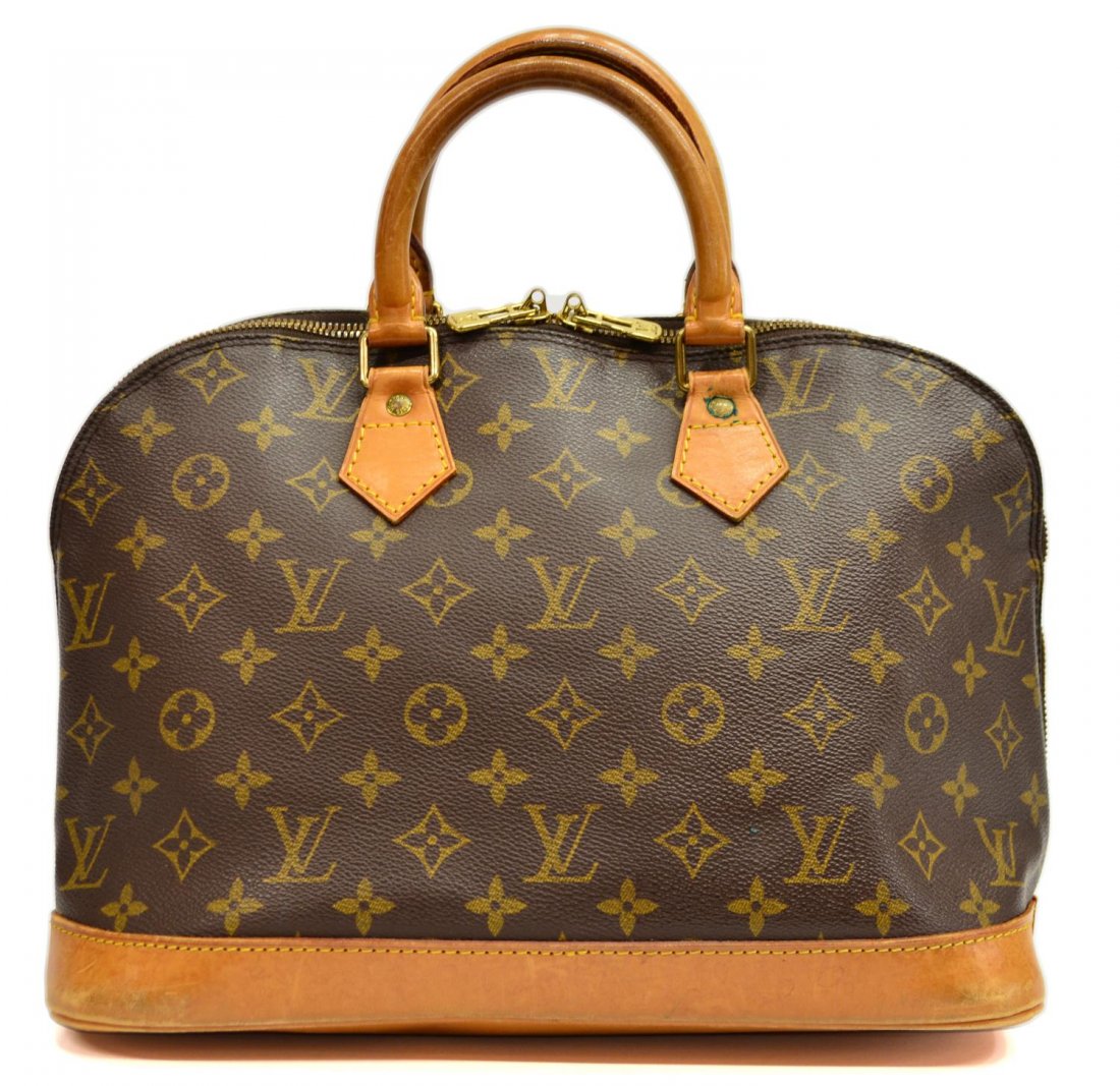 LOUIS VUITTON MONOGRAM CANVAS ALMA HANDBAG: Louis Vuitton 'Alma' handbag in monogram canvas, leather handles, lined in brown canvas, flat interior pocket, light spotting, wear to leather, bag: approx 10"h, 13"w, 6.25"d, 1.5lbs Start Price: $250