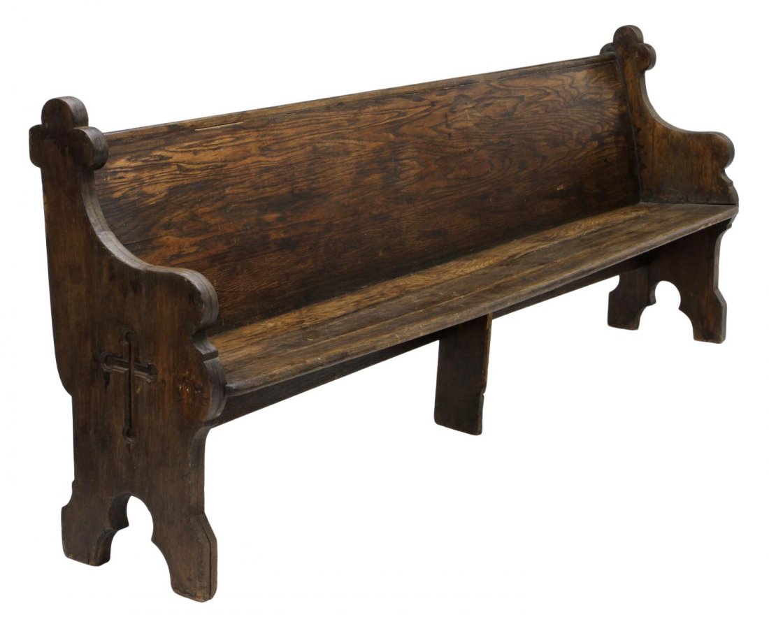 LONG ANTIQUE CONTINENTAL CARVED OAK CHURCH PEW: Continental oak church pew, the long bench having incised cross to one side, the other showing evidence of being attached to another bench, some loss, wear with age, approx 36.76"h, 90.75"l 15.5"d Sta