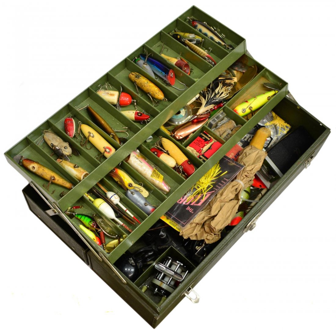 VINTAGE FISHING BOX PACKED FULL OF LURES & REELS: (lot) Vintage fishing tackle box with substantial quantity of lures and reels, highlights including Silver Horde, Creek Chub Bait Co. and other lures, some wood, some with inlaid glass eyes, Lowrance 
