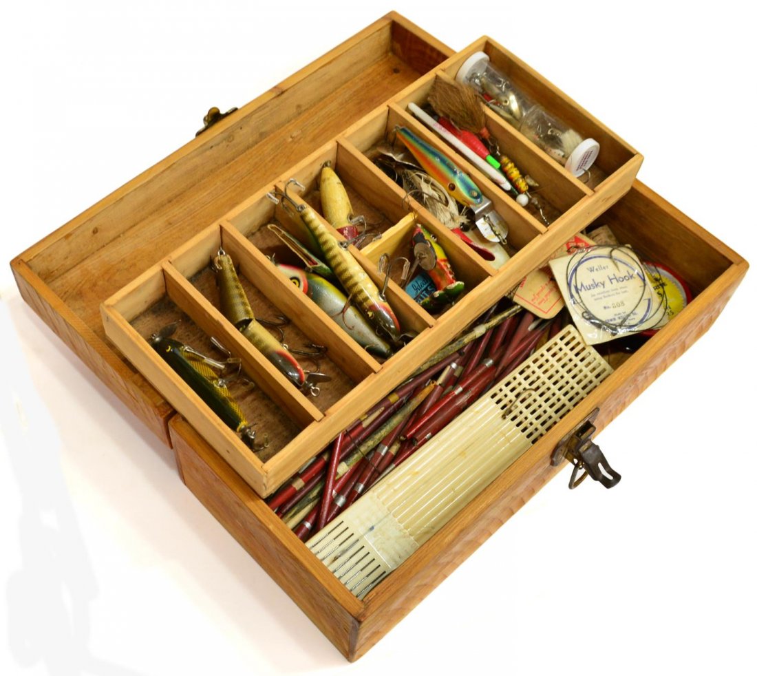 VINTAGE FISHING TACKLE BOX & ACCESSORIES: (lot) Vintage fishing tackle box with substantial quantity of lures and reels, highlights including a Creek Chub Bait Co. 'Deep Diver' and other lures, some wood, some with inlaid glass eyes, spinner