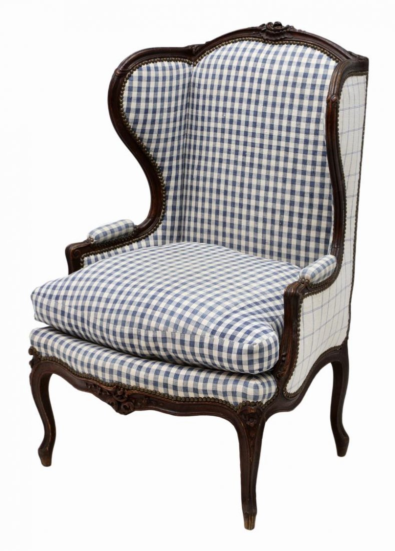 ANTIQUE FRENCH LOUIS XV STYLE WINGBACK CHAIR: French Louis XV style oak wingback arm chair, early 19th c., having blue and white checkered upholstery, removable down seat cushion, cabriole legs, 47"h, 29"w, 24"d *Provenance: From the estate of Do
