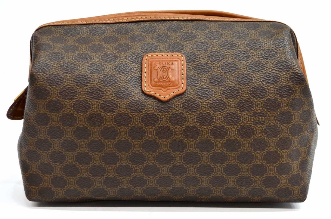 CELINE BROWN CANVAS & LEATHER TRAVEL POUCH: Celine travel pouch in brown monogrammed canvas, Made In Italy, with tan leather accents, two interior slip pockets, pouch: approx 8"h, 9"w, 3"d, .75lb Start Price: $50.00