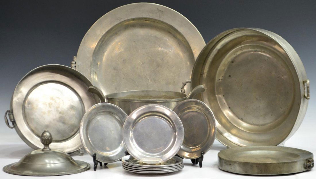 GROUP OF VINTAGE & ANTIQUE PEWTER TABLE ITEMS: (lot) Group of vintage and antique pewter table items, highlights include warming dishes, one marked London, handled serving dishes, plates marked Wilton Columbia, PA U.S.A., some dated 1973, lid, etc