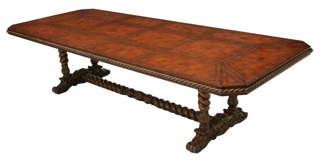 MAITLAND-SMITH DINING CONFERENCE TABLE, 122"L: Maitland-Smith dining or conference table, 20th c., the rectangular rope edge top having leather panels separated by parcel gilt foliate tooling, angled corners, rising on the twist legs and stretcher
