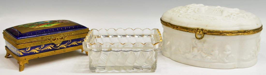 (3)BACCARAT & LIMOGES PORCELAIN, GLASS TABLE BOXES: (lot of 3) French dresser items, comprising: (1) Baccarat molded glass dish, the rectangular form in a swirl pattern with a gilded border, gilt loss, 2.25"h, 5"w, 3.75"d; (1) Limoges oval form bisque 