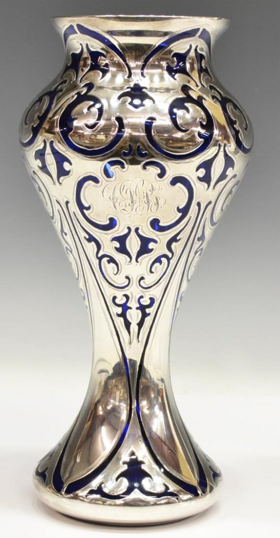 ORNATE SILVER OVERLAY & COBALT BLUE VASE: Silver overlay cobalt blue vase of baluster form, scrolled foliate decoration, monogrammed, approx 10"h, 4.5"w, 1.25lbs *Provenance: From the estate of noted San Antonio & Austin resident Todd Denman 