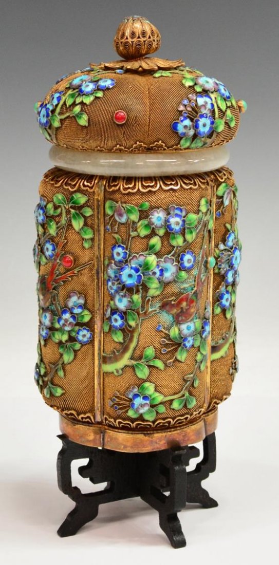 FINE CHINESE SILVER-GILT FILIGREE ENAMEL JAR: Very fine Chinese silver-gilt filigree and enameled jar with cover, enameled flowering stalks spaced by colored cabochons on the melon form lid surmounted by a filigree finial, ruyi-head trim, a jade